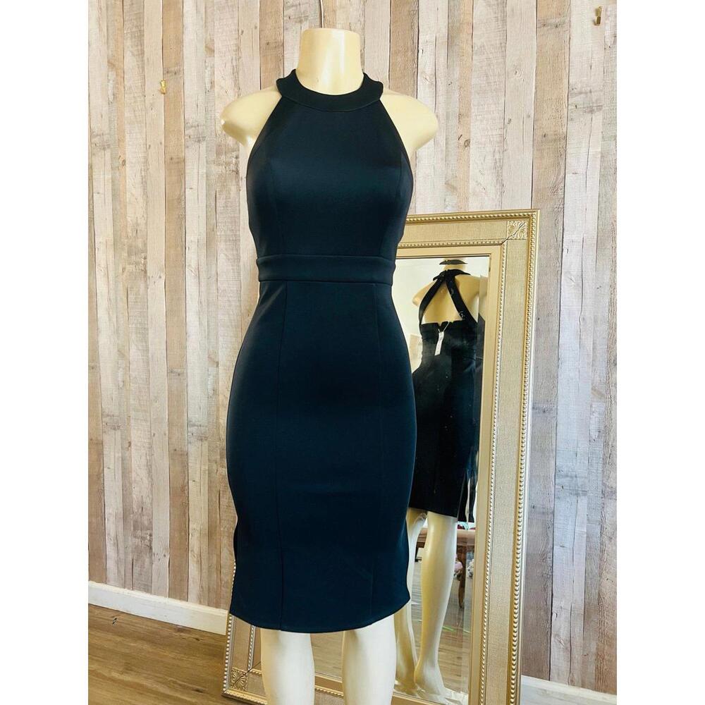 Beautiful dress, fitted to the body, black color, BCBG